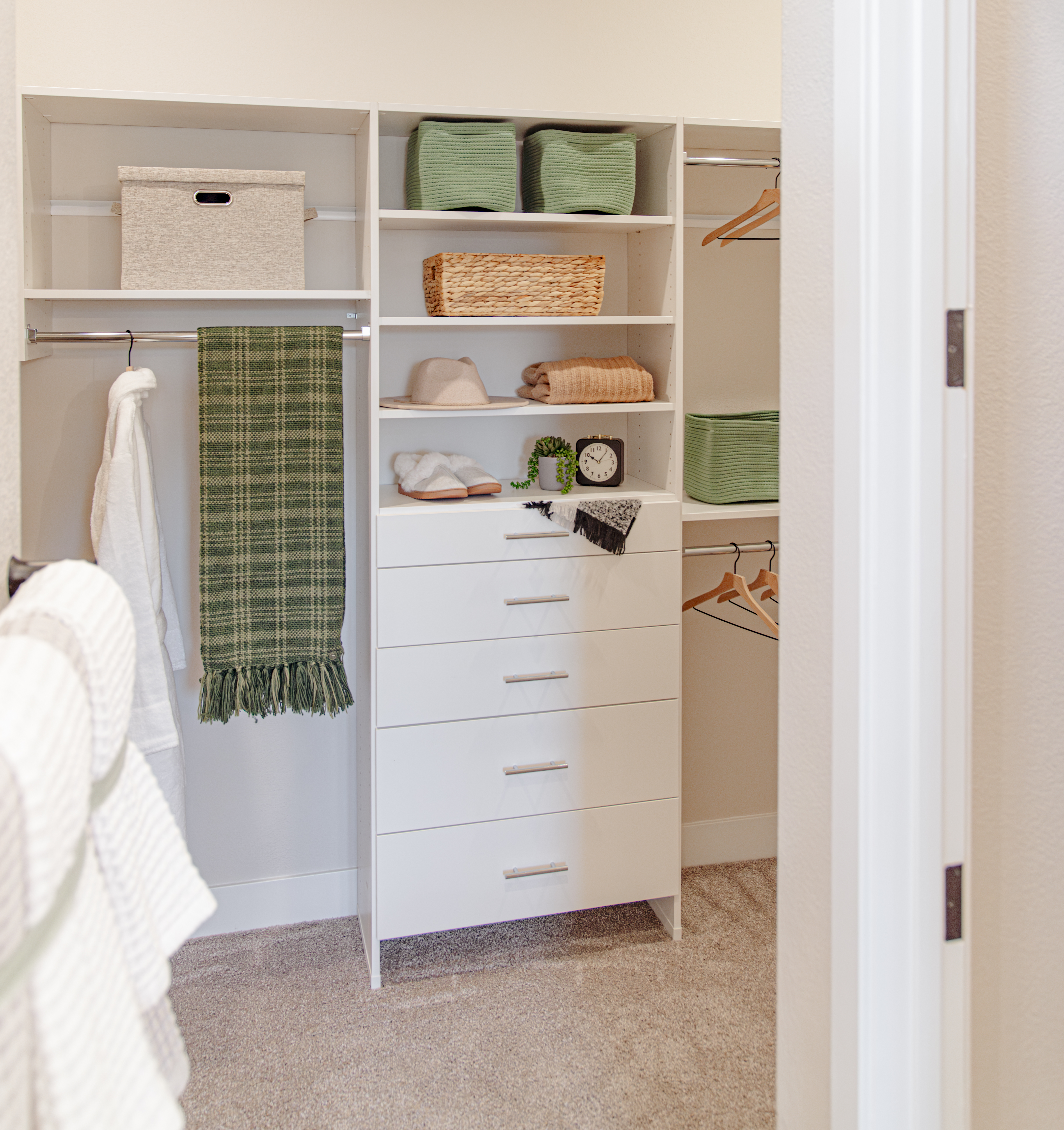 Select walk-in closet in white.