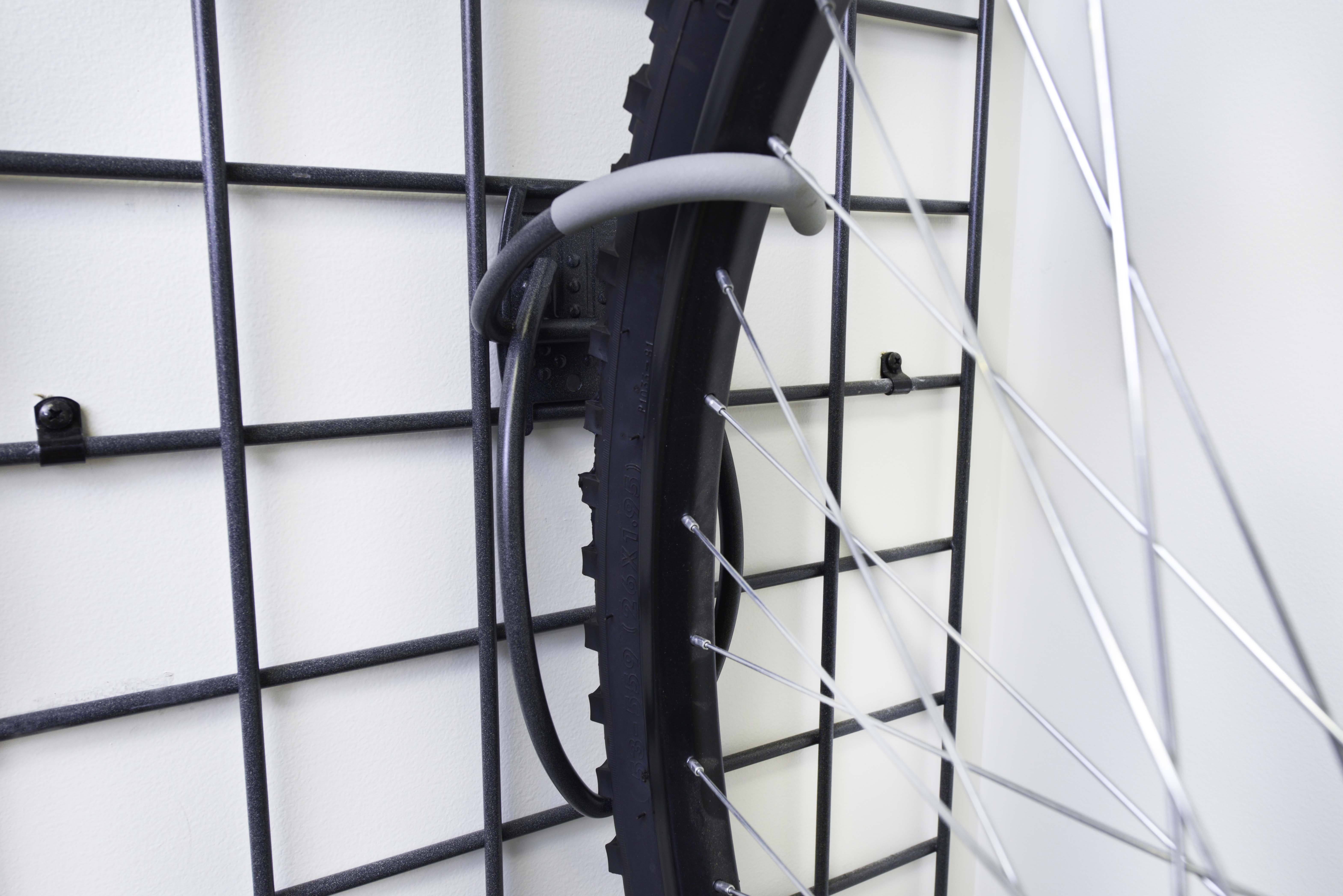 Bike Hook close up showing bike wheel being properly hung and protected. 