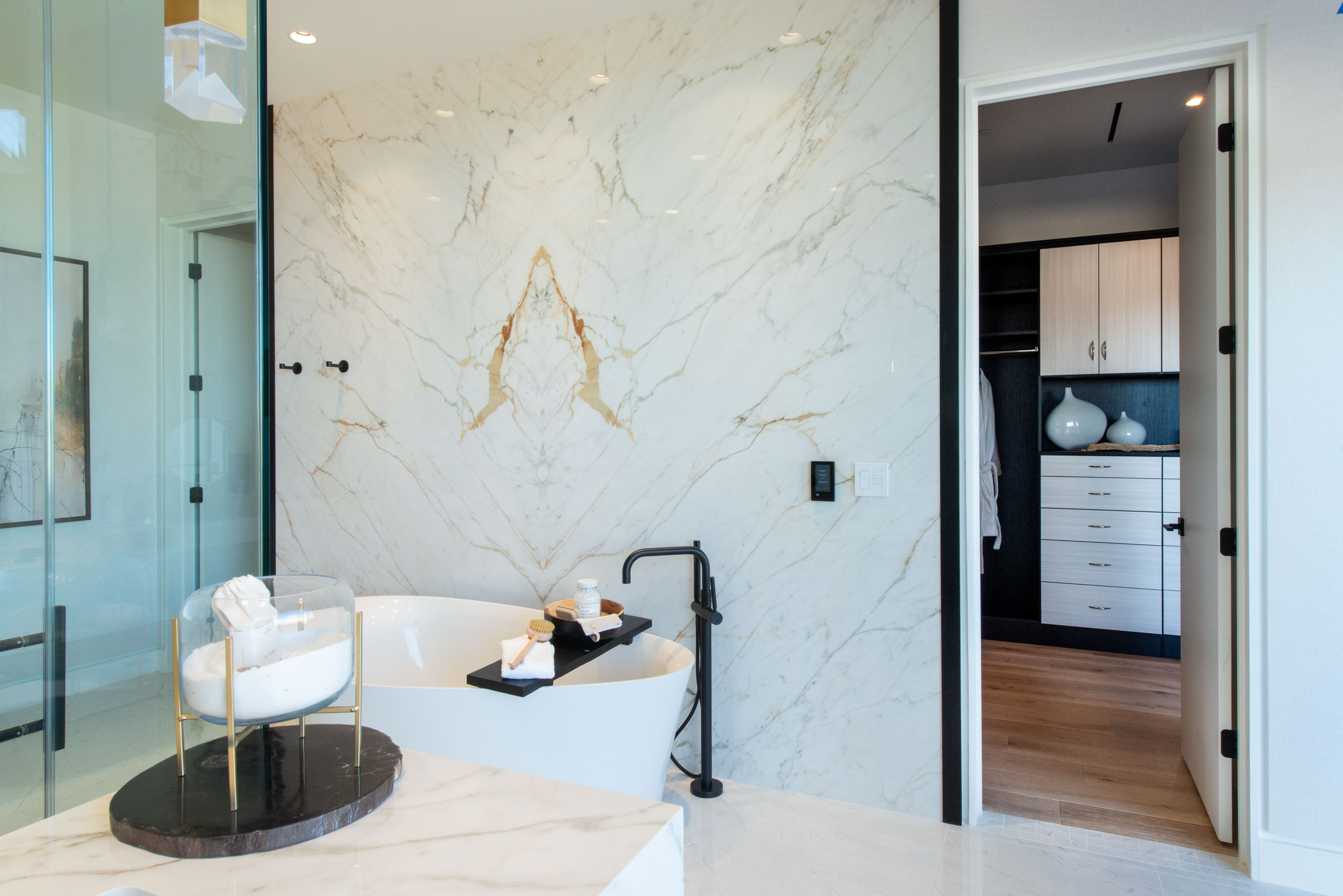 Bright White Bathroom with bathtub to relax. 