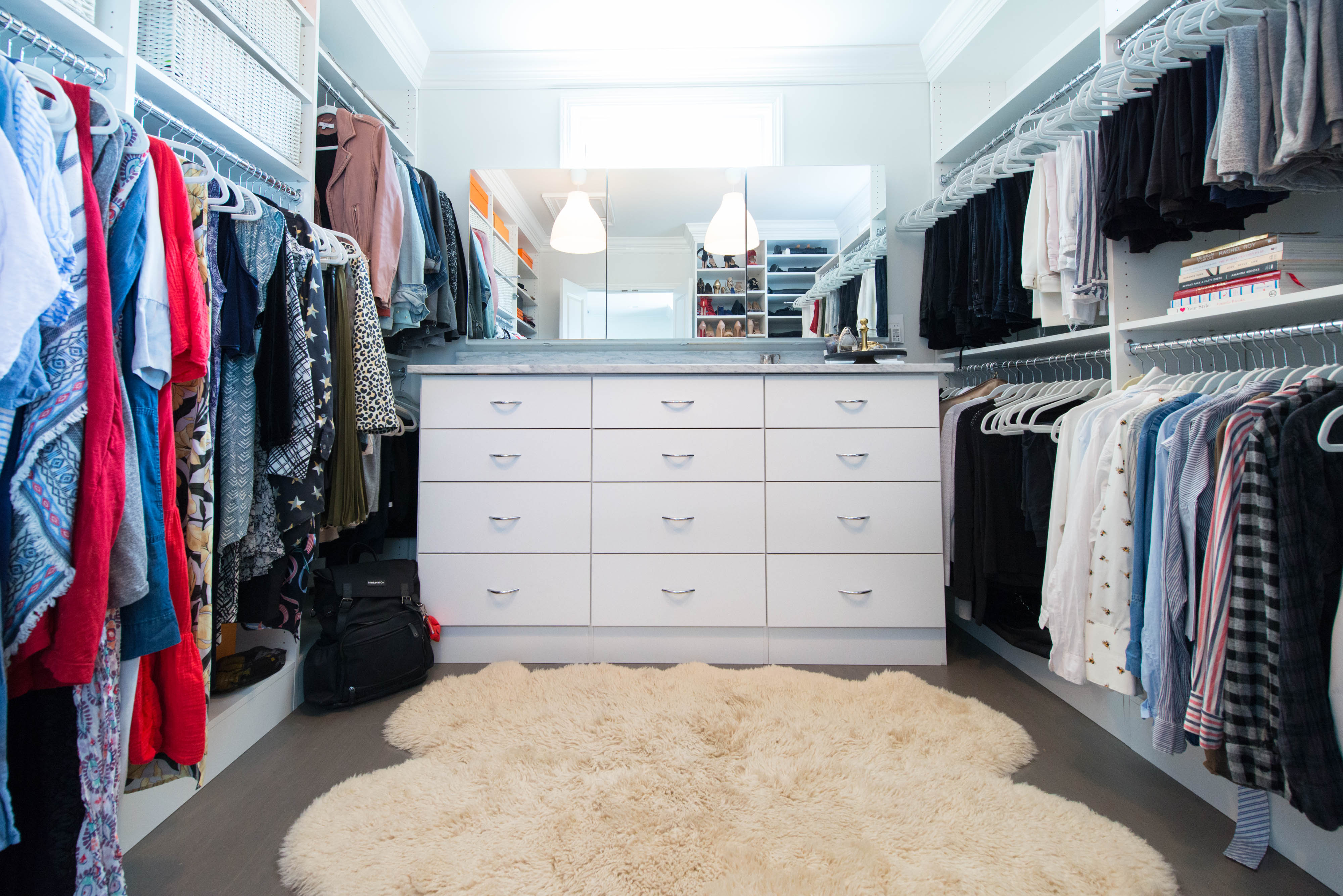 Classica Walk-in Closet in White with women and men clothing.