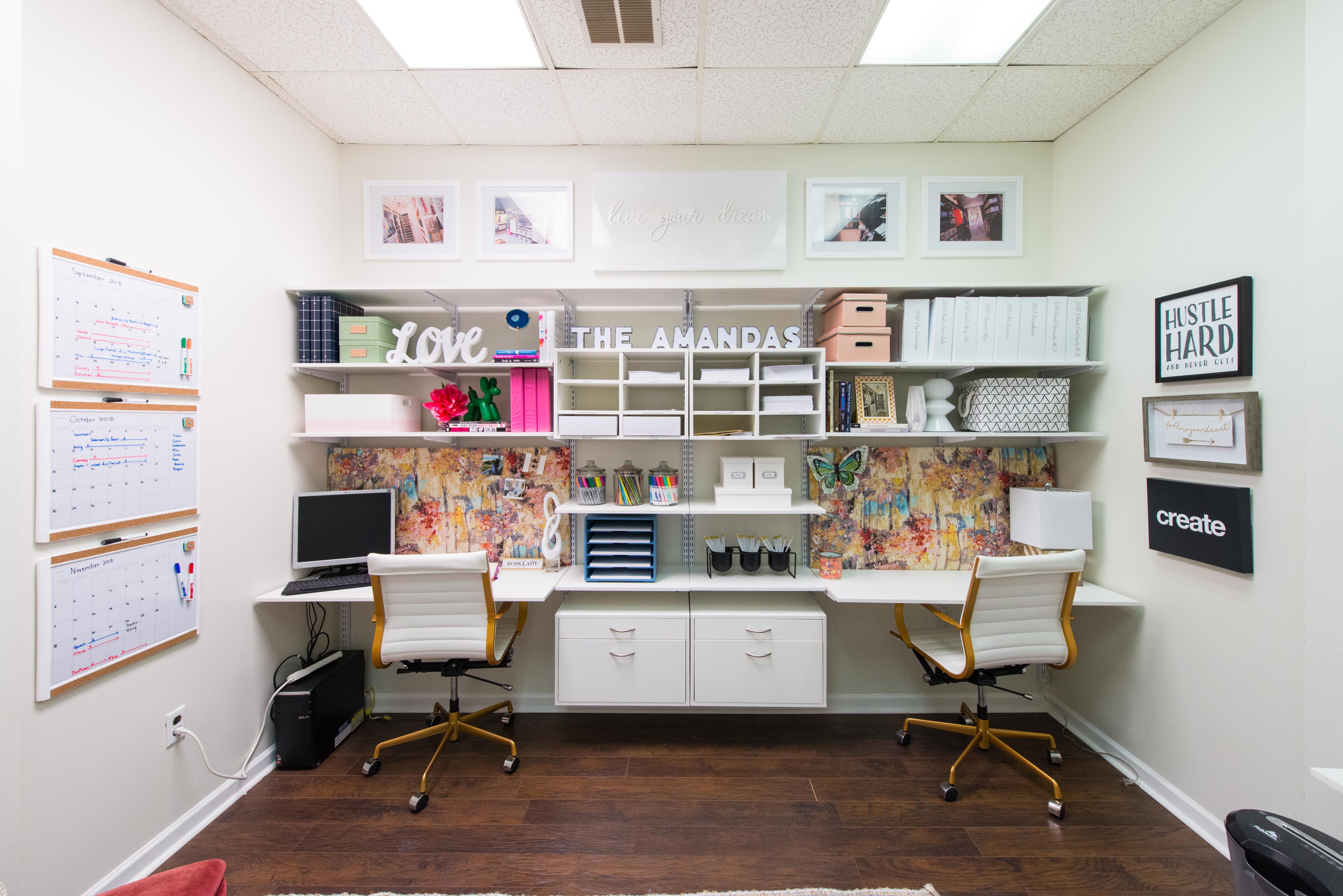freedomRail Dual Office in White with colorful wallpaper and office supplies.