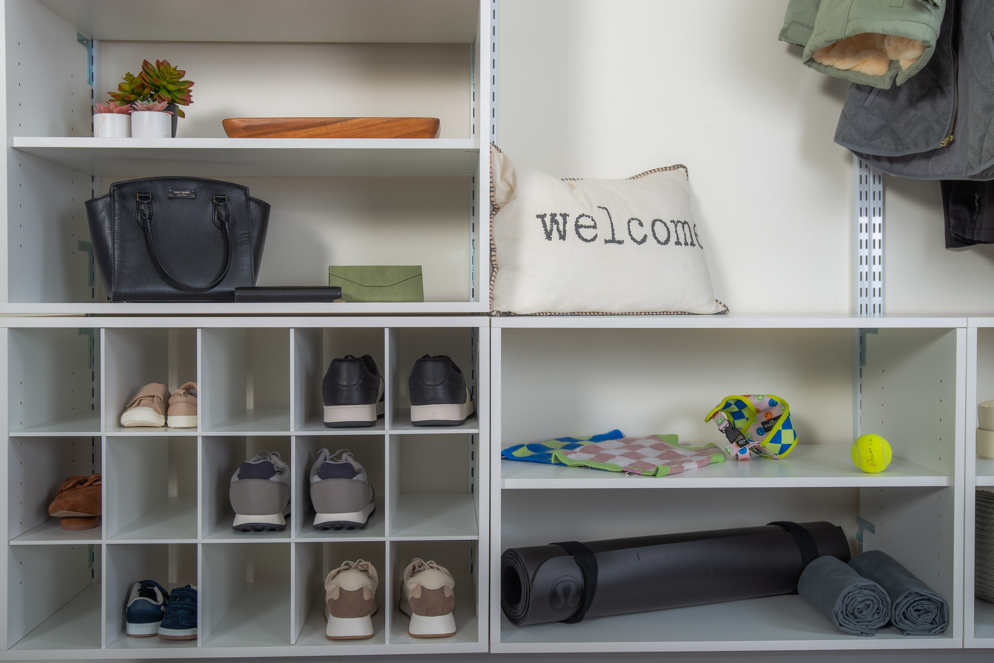 freedomRail Entry in White with shoes, purse, dog accessories, and pillow that says 