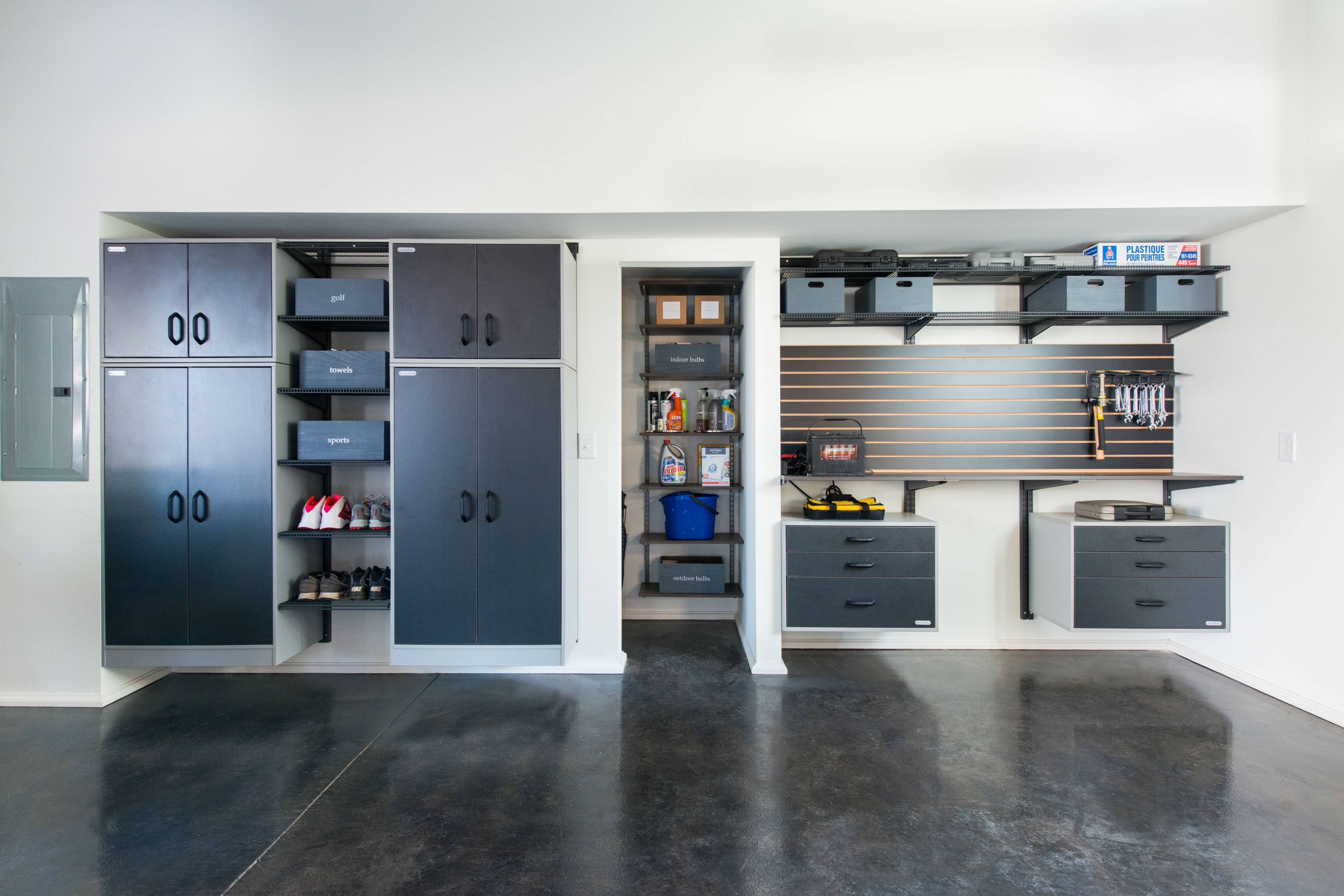freedomRail Garage with cabinets, and drawers.