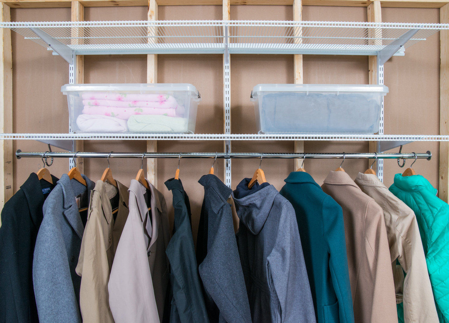 freedomRail Storage Closet in White with containers and winter coats