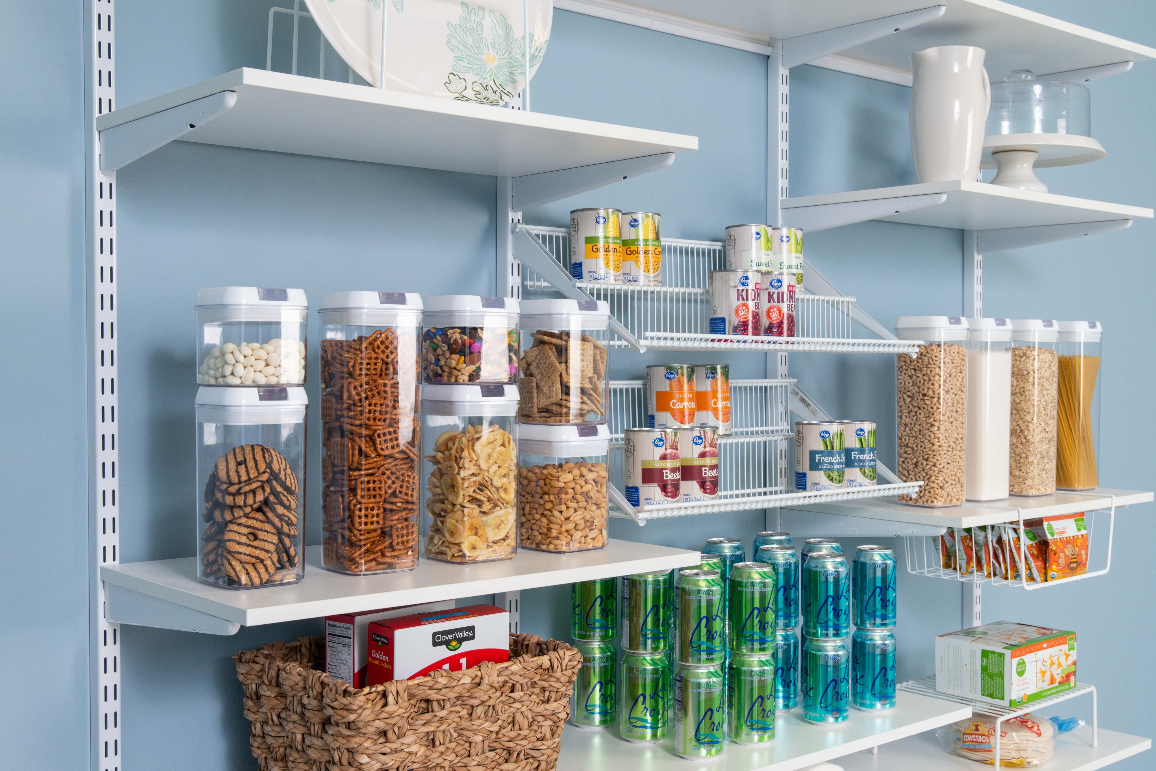 freedomRail White Pantry with cans and clear containers.