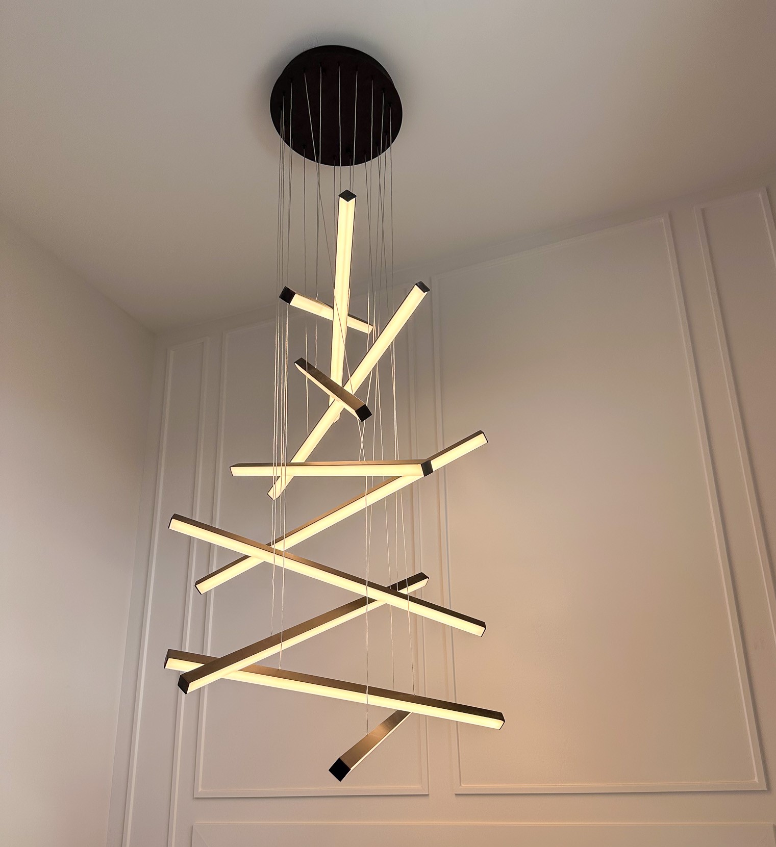 Homearama 2023 Lighting Fixture with 10 light bars in a geometrical shape.