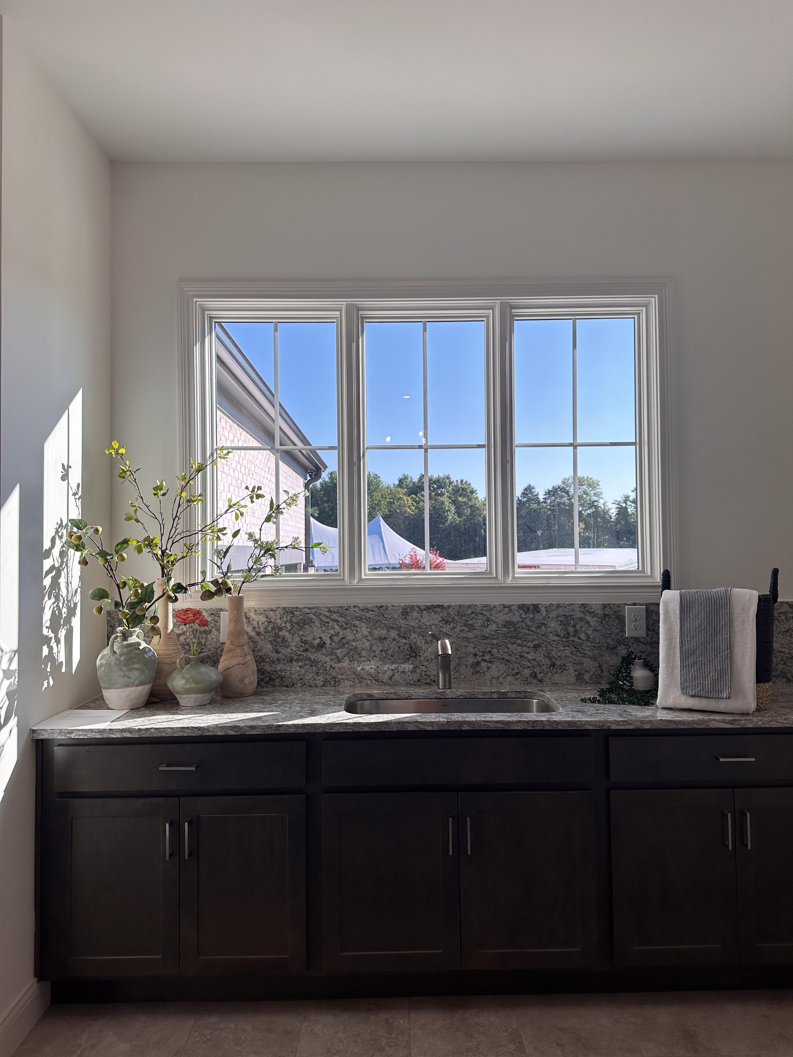 Homearama 2024 Natural Decor with natural lighting, plants, and sunshine.