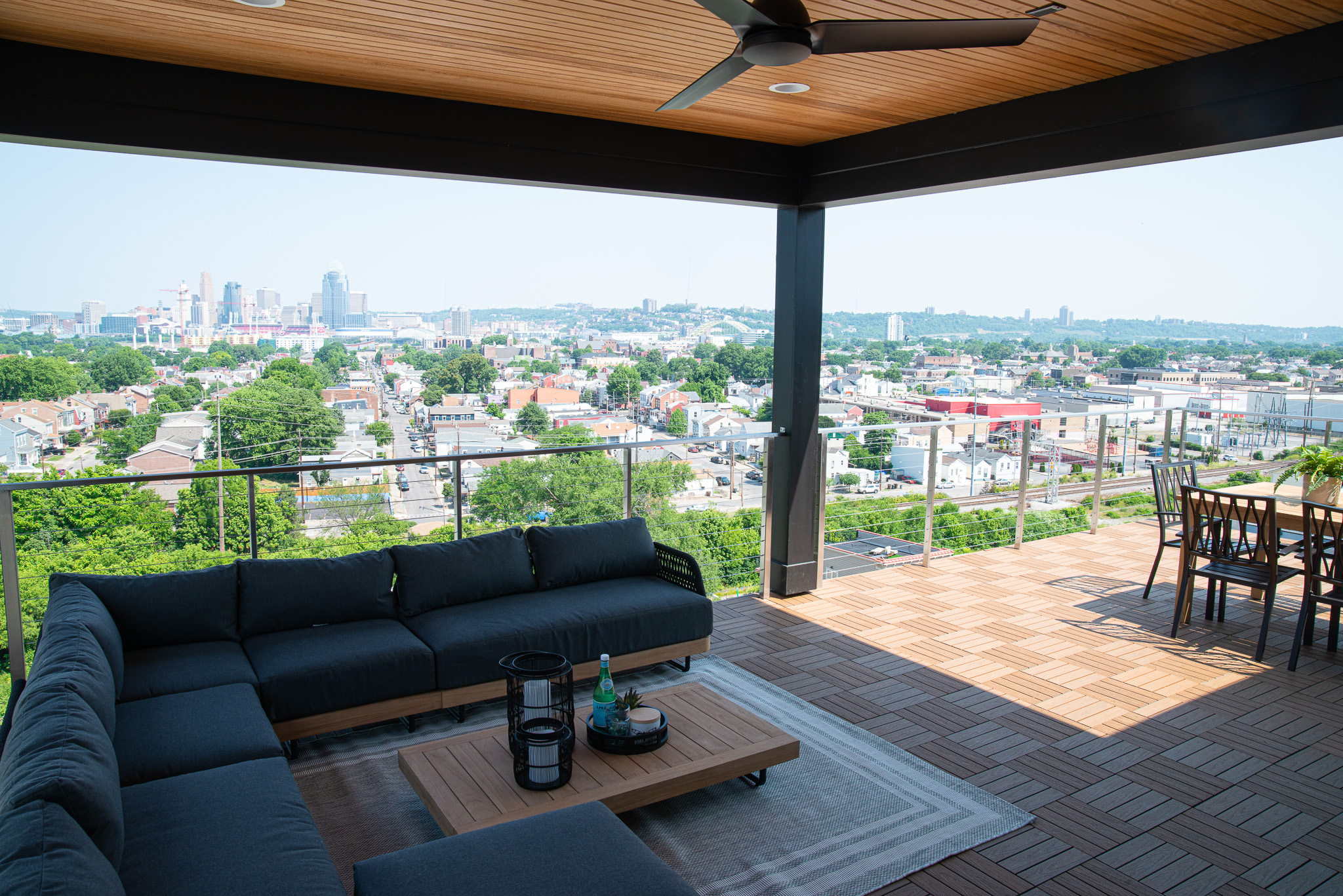 Homes by Gerbus Outdoor Living with lounge couch and view of Downtown Cincinnati.