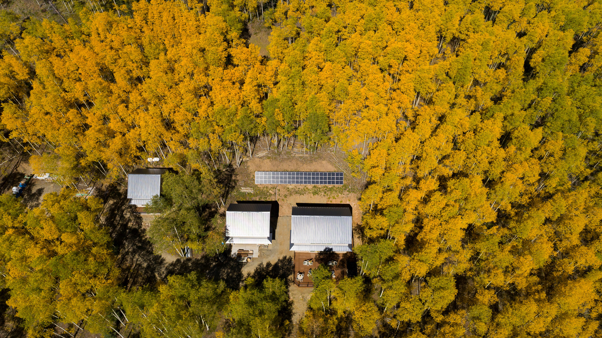 Mariposa Meadows Birds Eye View Photo with trees, and overhead view of compund.