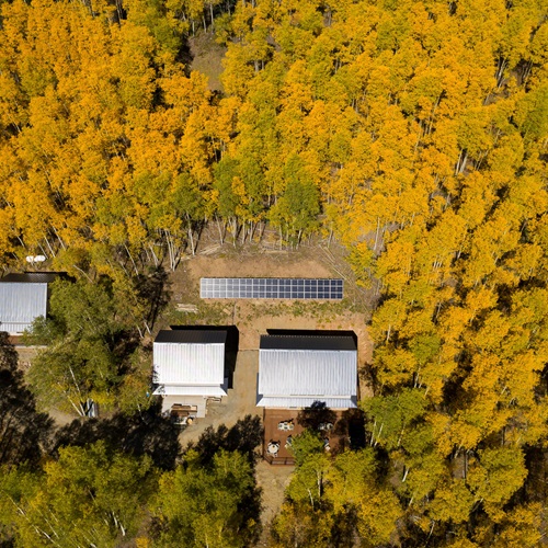 Mariposa Meadows Birds Eye View Photo with trees, and overhead view of compund.