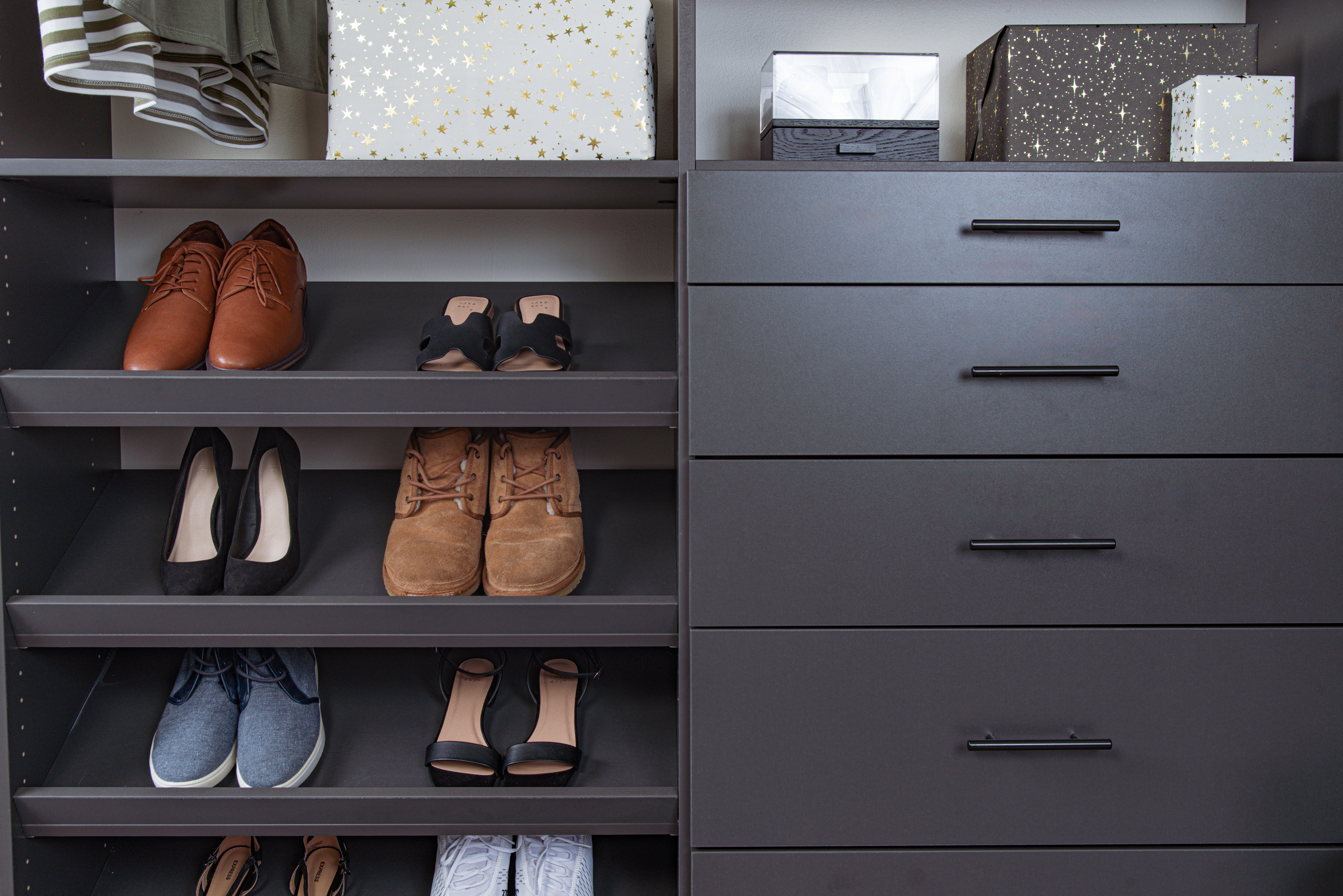 Select Close Up in Slate with shoes, drawers, and mix of presents on shelves.