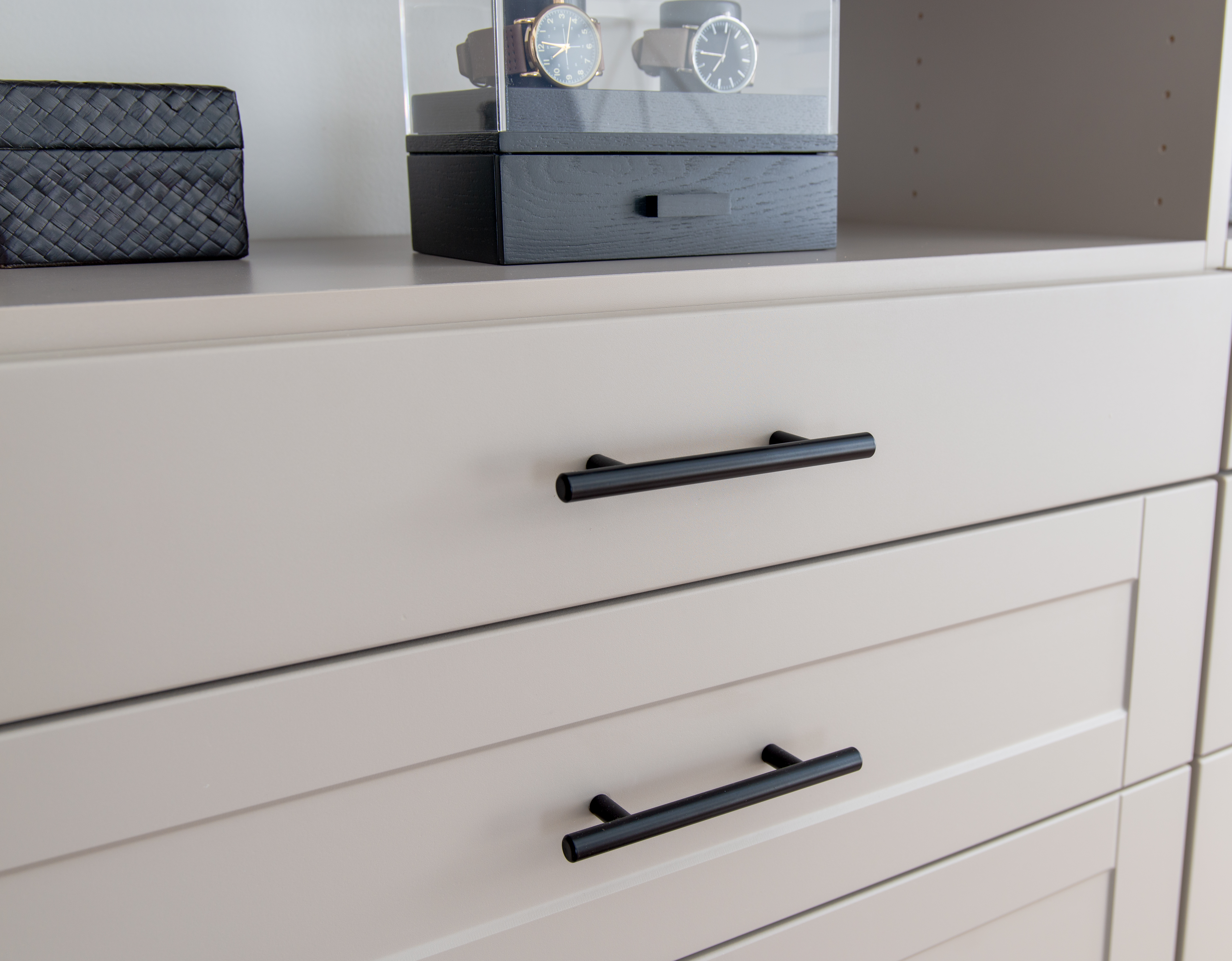 Select Closet in Century Gray with black hardware, watch box, and black woven box.