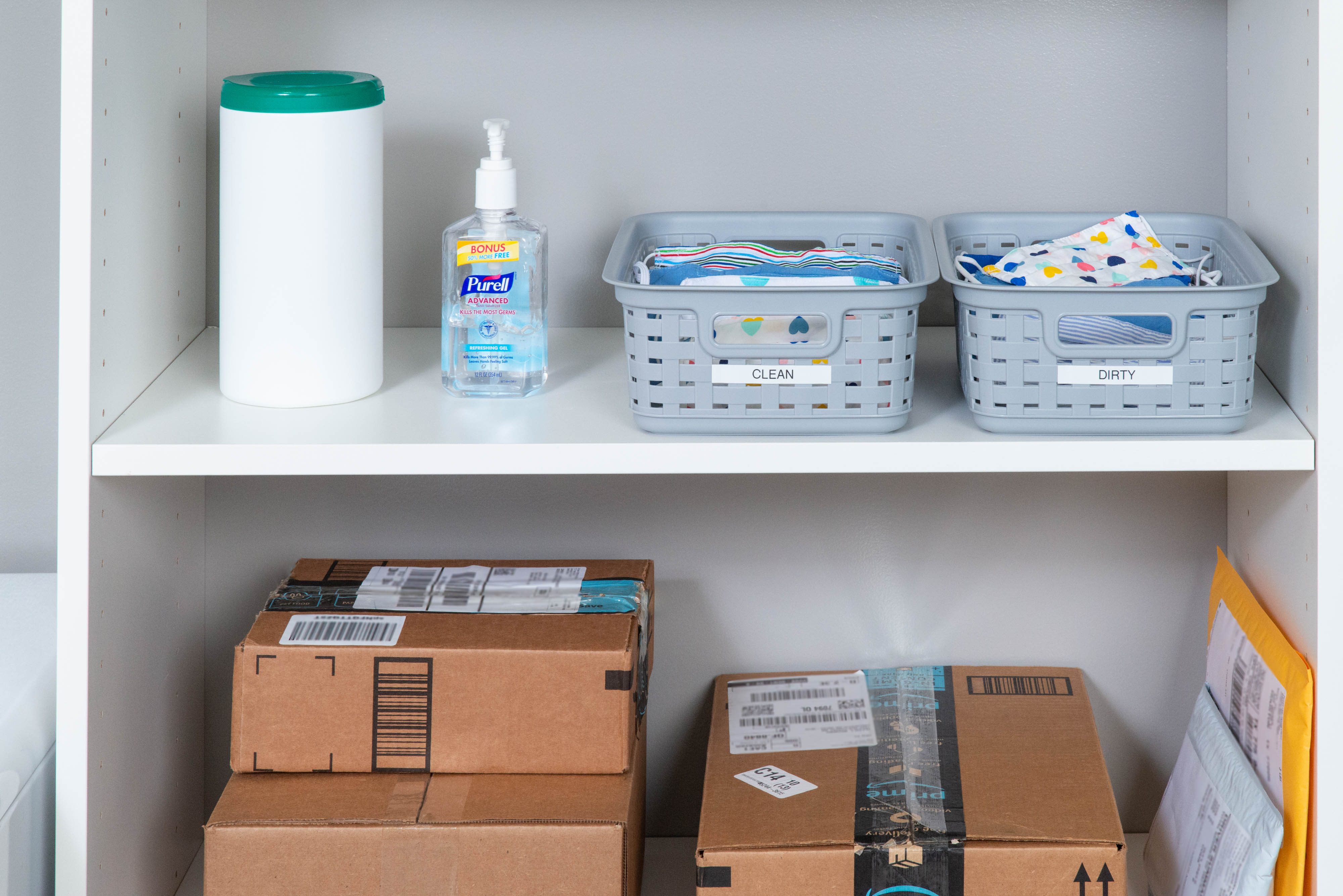 Select White Package Room with packages and masks.