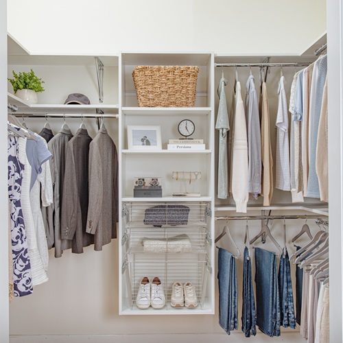 VUE_White_Bedroom with men and women clothing, neutral clothing and long hang on the left and double hang on the right.