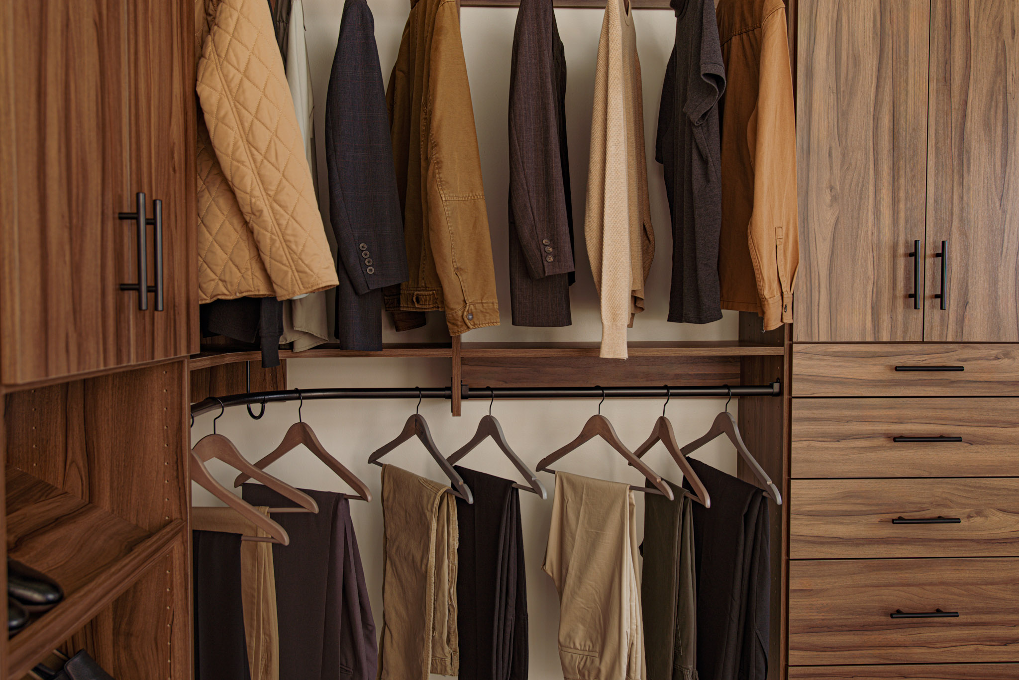 Classica_Bedroom_WhiskeyWalnut with 2 towers and men's clothing double hang in the middle.