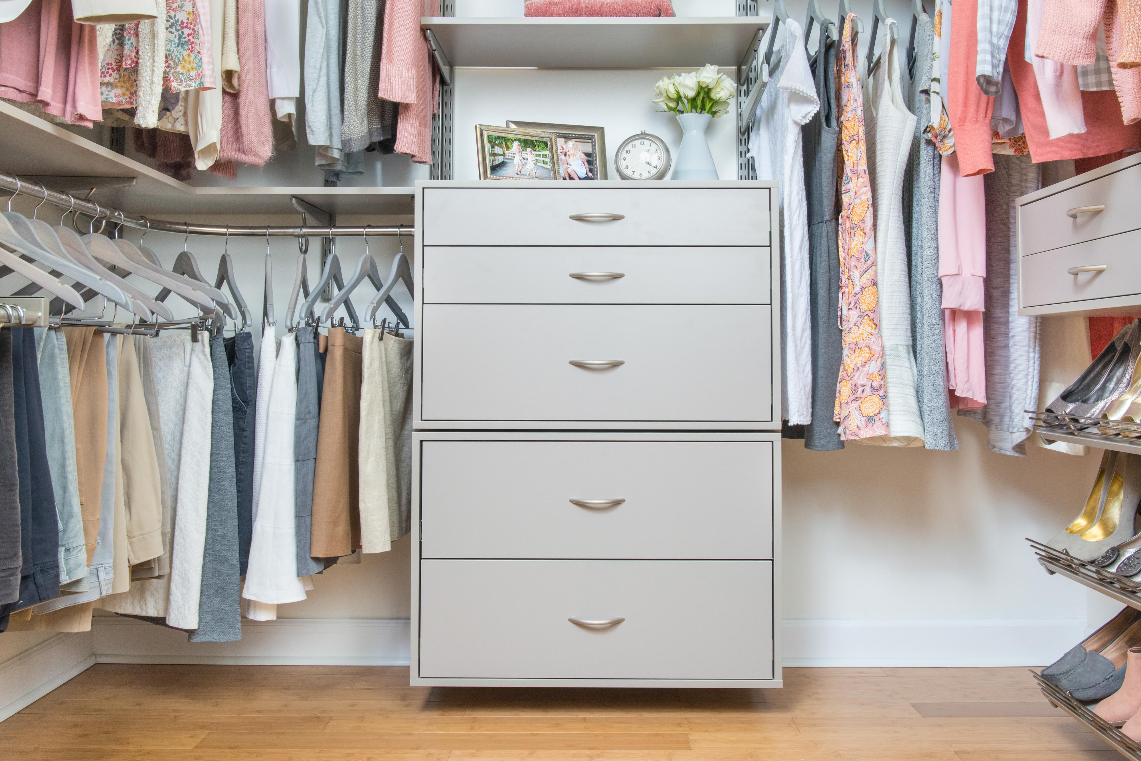 freedomRail Century Gray women's closet with pink clothing and shoes.