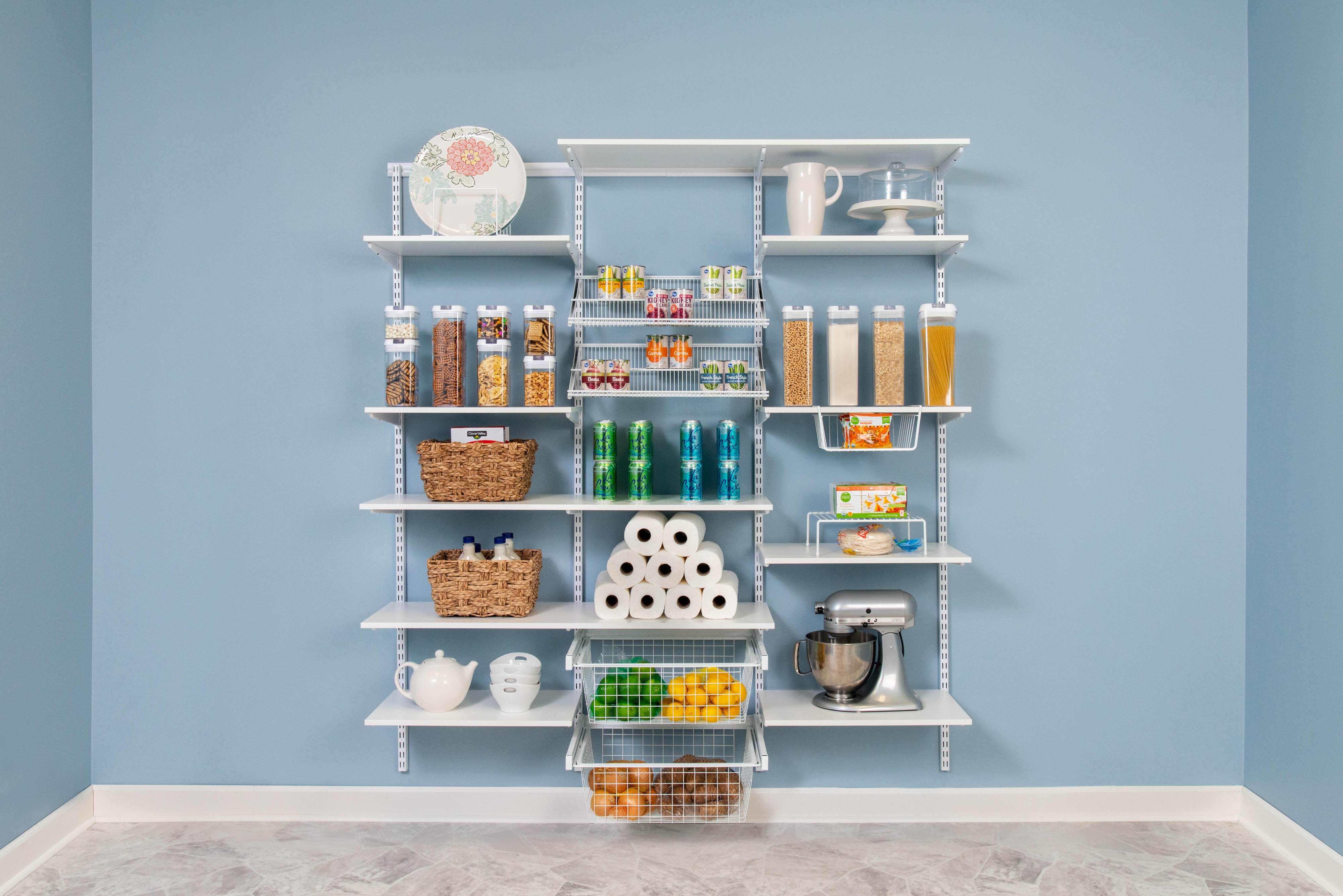 freedomRail Pantry in White with dishes and paper towels.