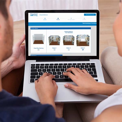 Closet Selector software on laptop being used by homebuyers