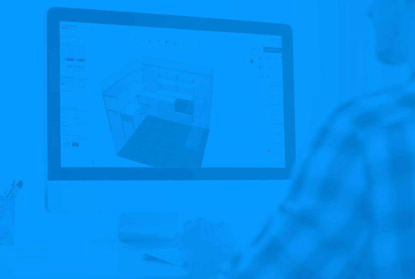 man designing closet on computer