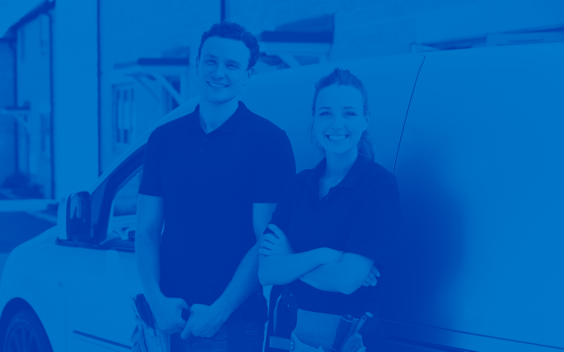 this is an image of 2 installing dealers standing by a truck with a blue overlay.