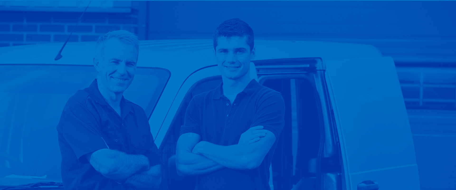 This is an image that has a blue overlay and on that image is a 2 men standing next to a white van with their arms crossed.