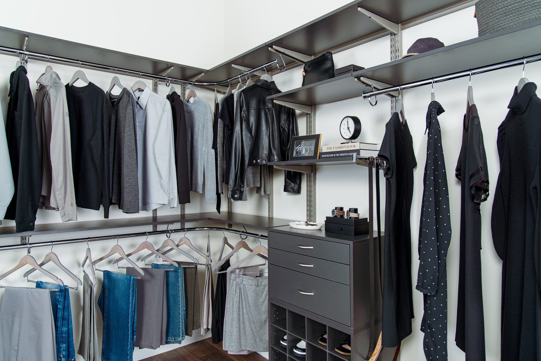 Walk-in Select Closet in Century Gray with women and men clothing with accessories, light flooring and neutral background.