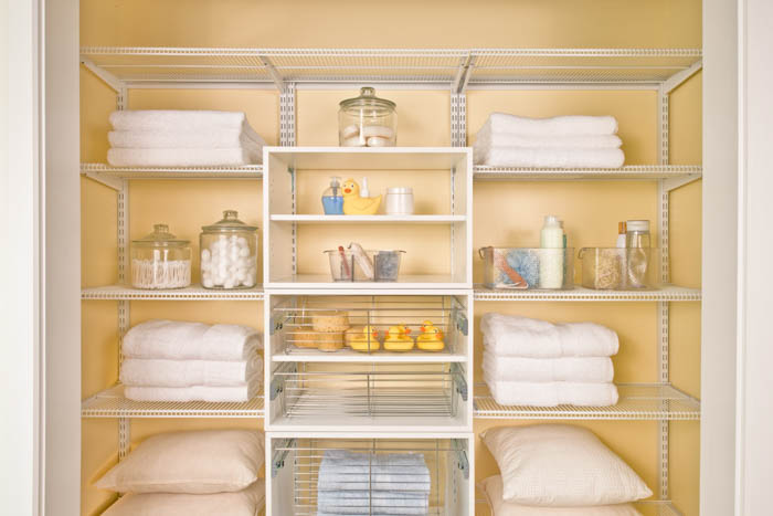 freedomRail white reach-in linen closet
