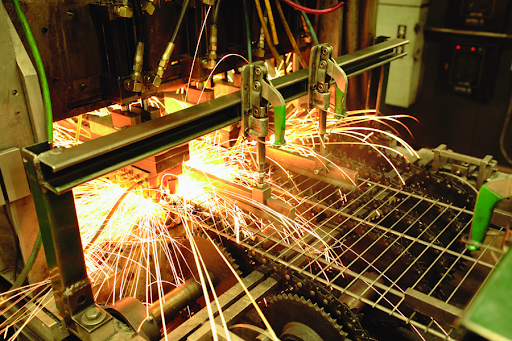 Schulte Ventilated Shelf being welded in factory