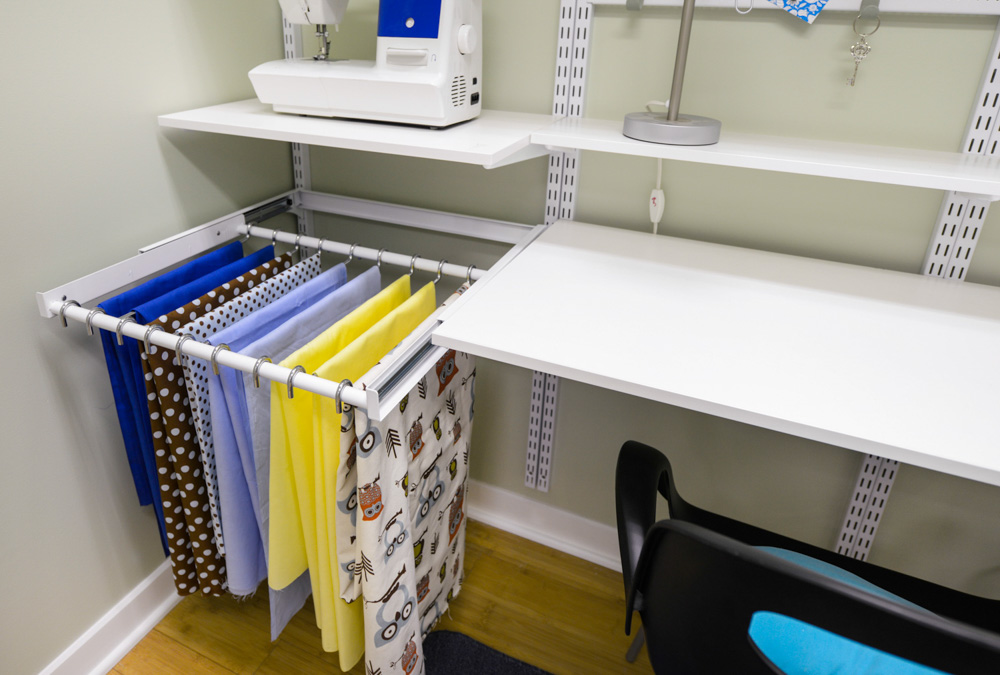 freedomRail Built-in Storage in White with drawers and baskets.