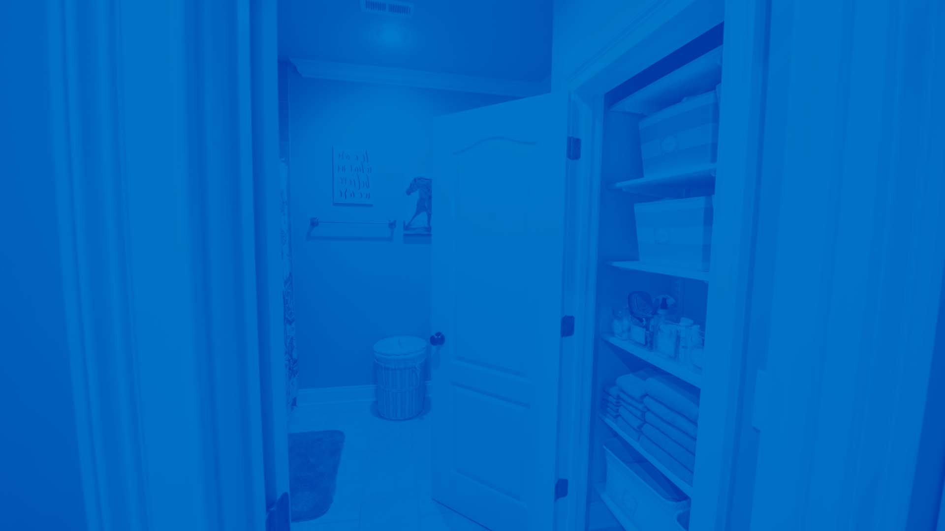 freedomRail linen closet in White located in a bathroom