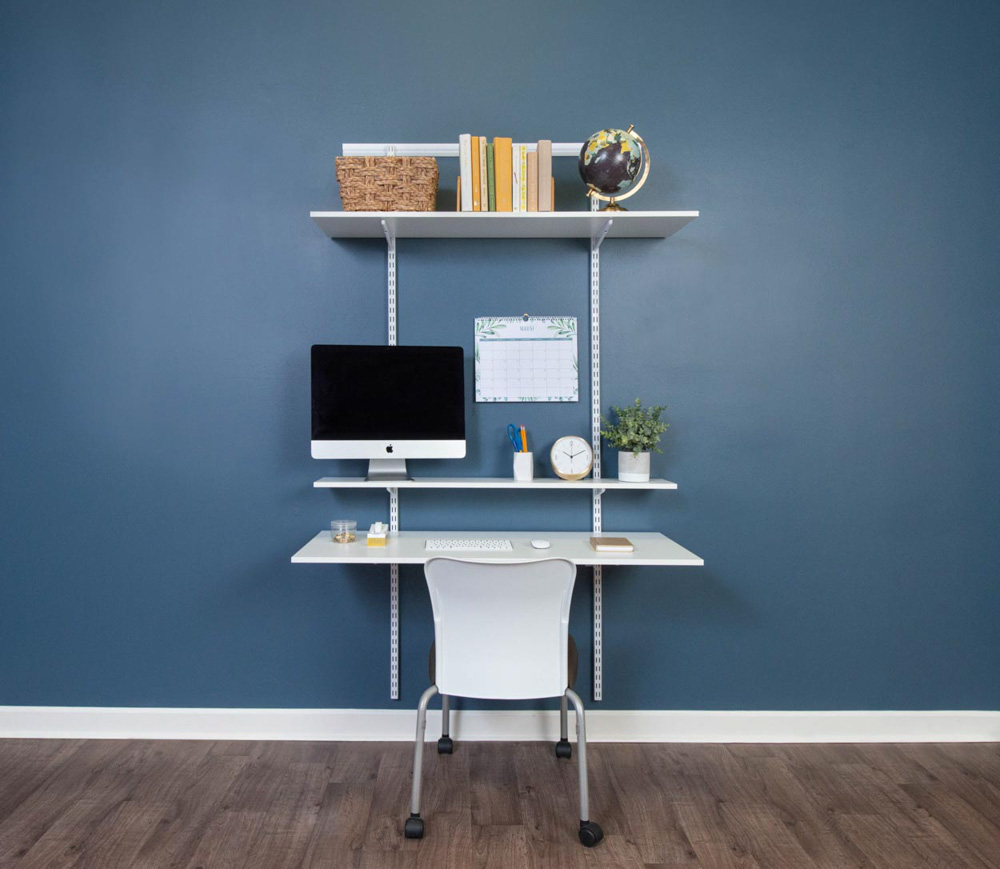 freedomRail Office in White with desktop and navy walls.