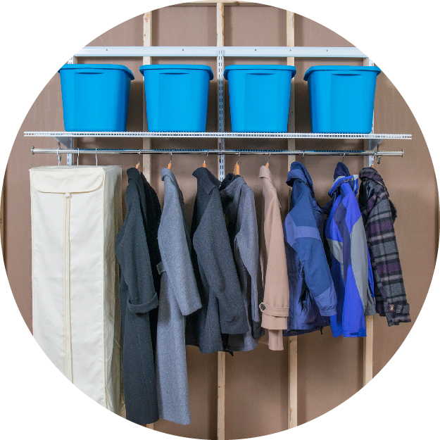 Storage freedomRail Closet with storage items and coats.