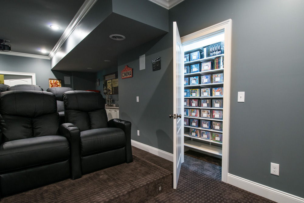freedomRail Movie Room Closet in White with chairs and gray walls.