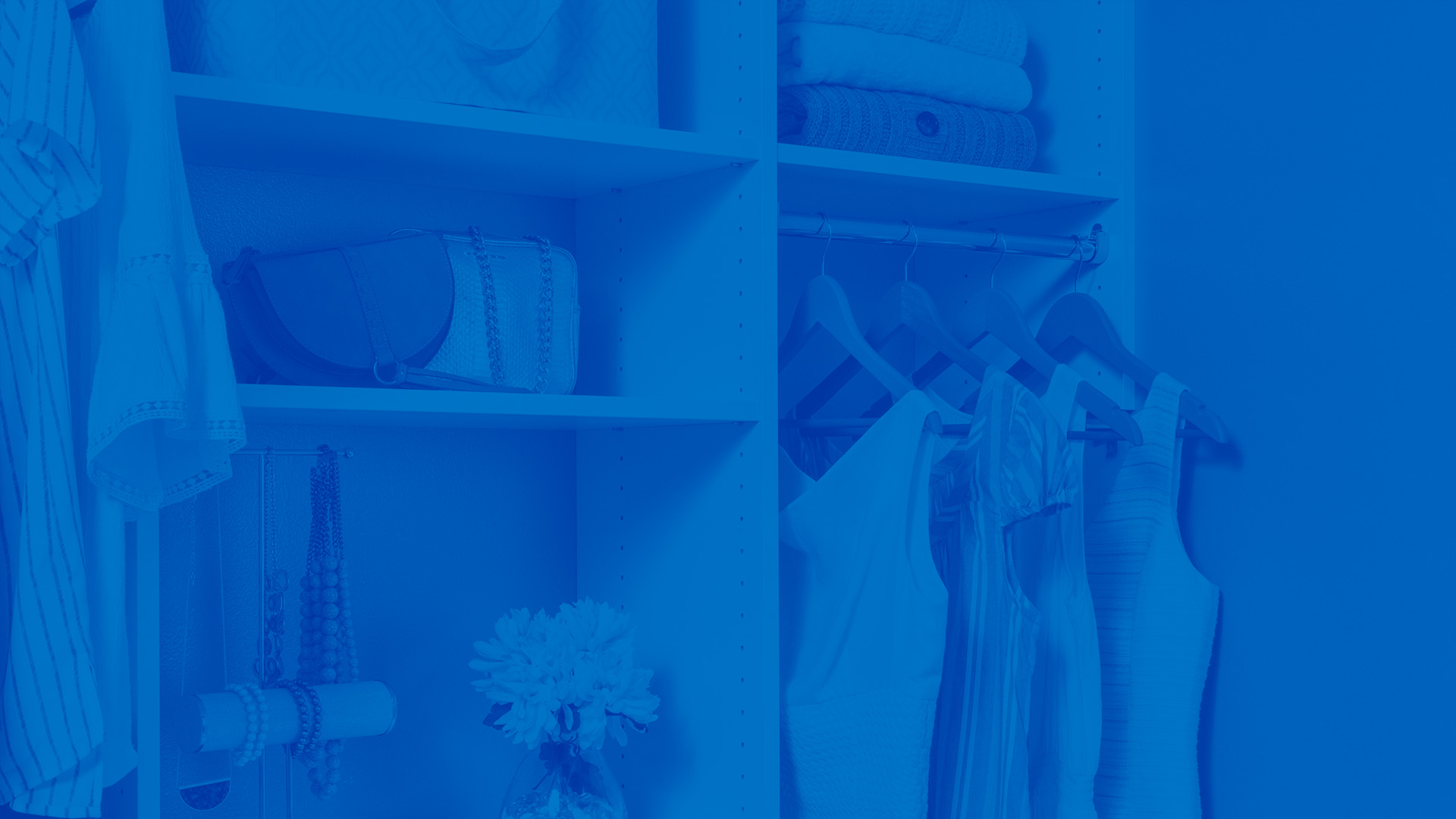 Select Closet with clothes hanging