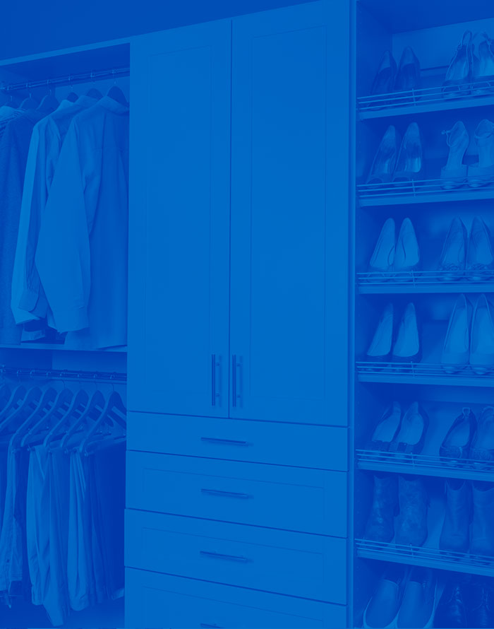 Walk-in Classica closet with shoe shelves and hanging clothes