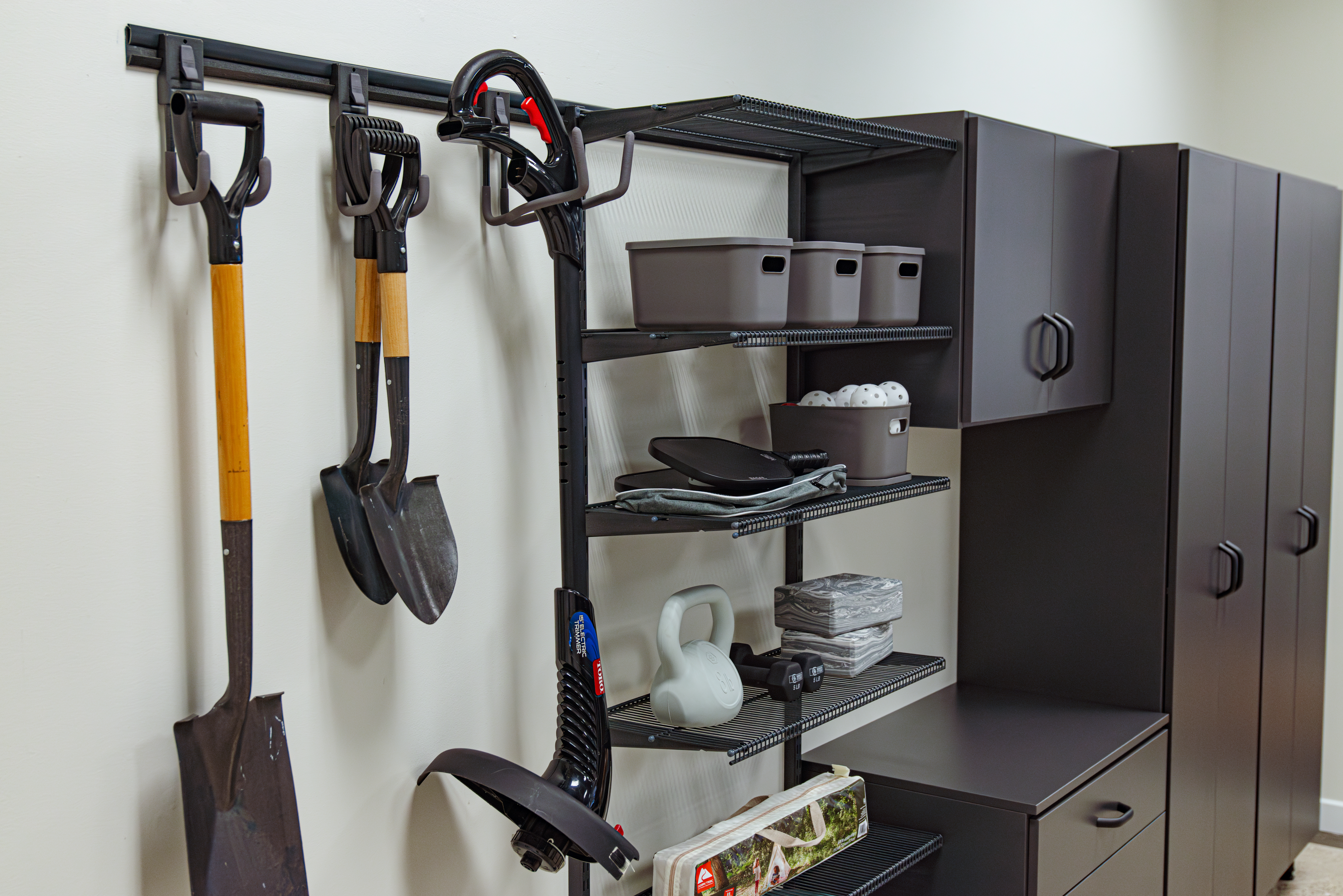freedomRail Garage in Granite Gray with 8 cabinets and baskets.