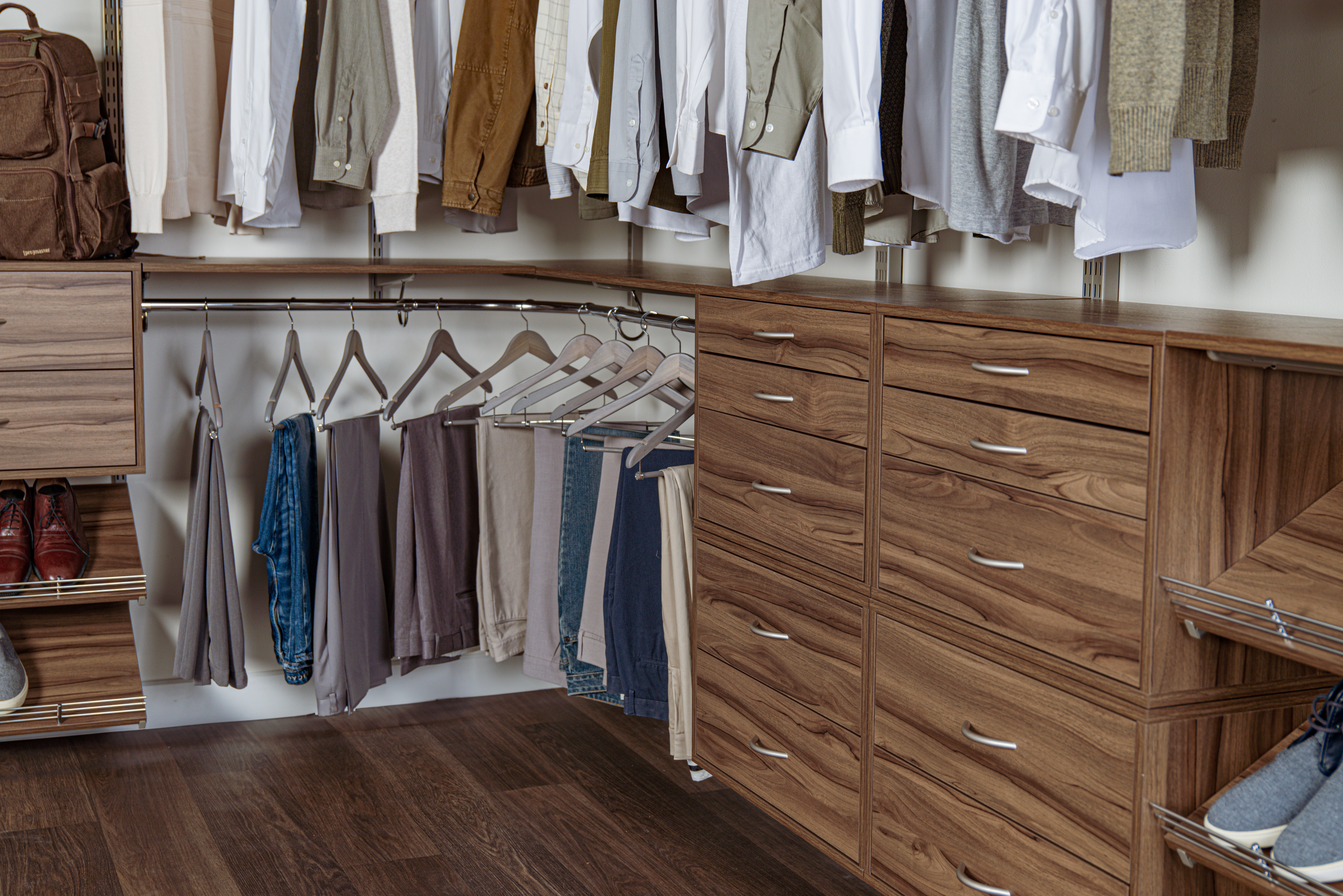 freedomRail bedroom closet in whiskey walnut.