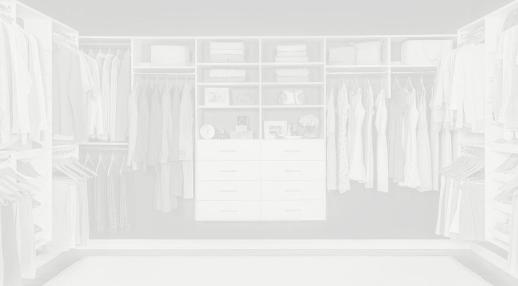 White walk-in closet with clothes, sweaters, drawers and shoes